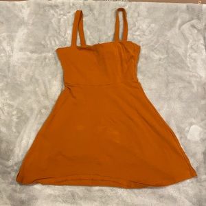orange open back with tie dress